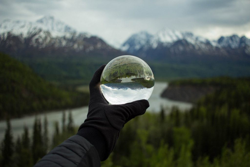 creative image of transparent ball in the nature