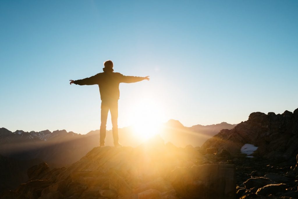 man on top of a hill