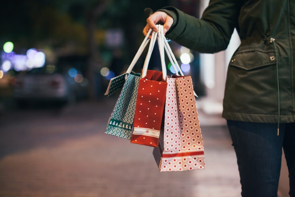 girl carrying a shopping bags